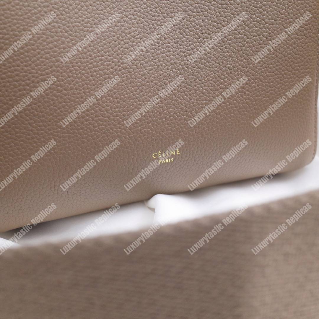 Ce**e sangle small bucket bag in soft grained calfskin taupe