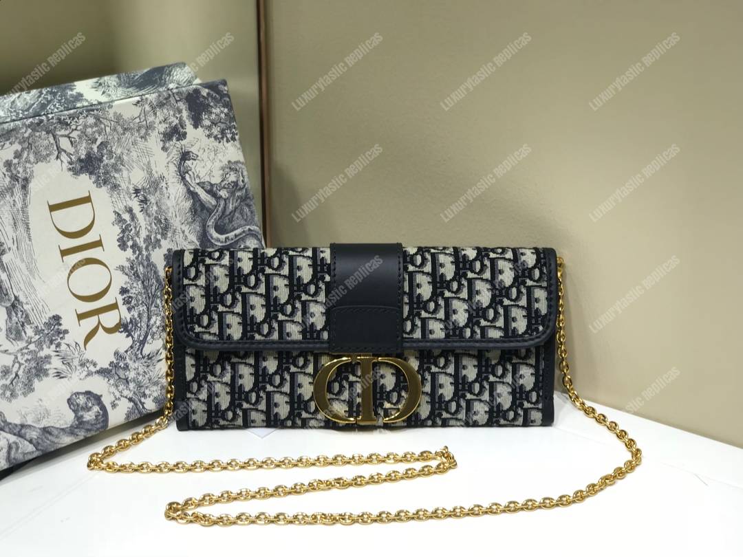 30 Montaigne Jacquard Canvas Clutch Bag Blue