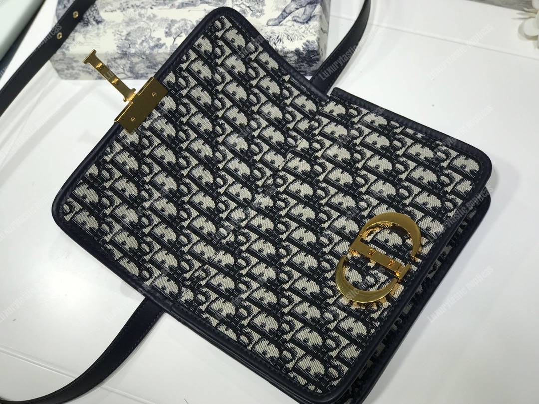 30 montaigne D*or oblique flap bag blue