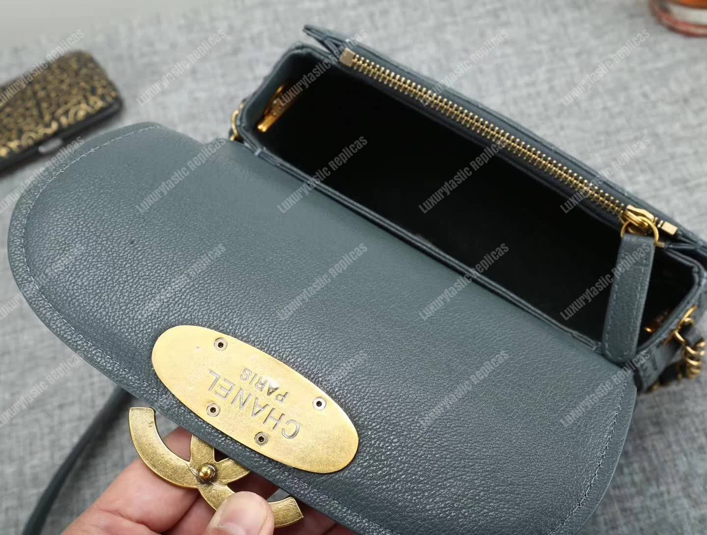 Ch*el medium flap bag with top handle grey