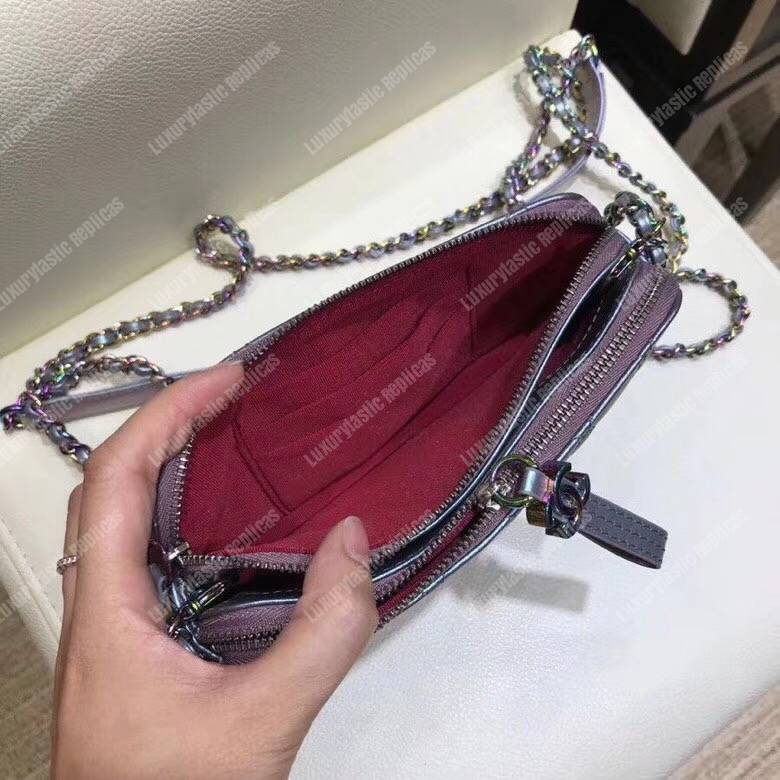 Ch*el clutch with chain purple metallic