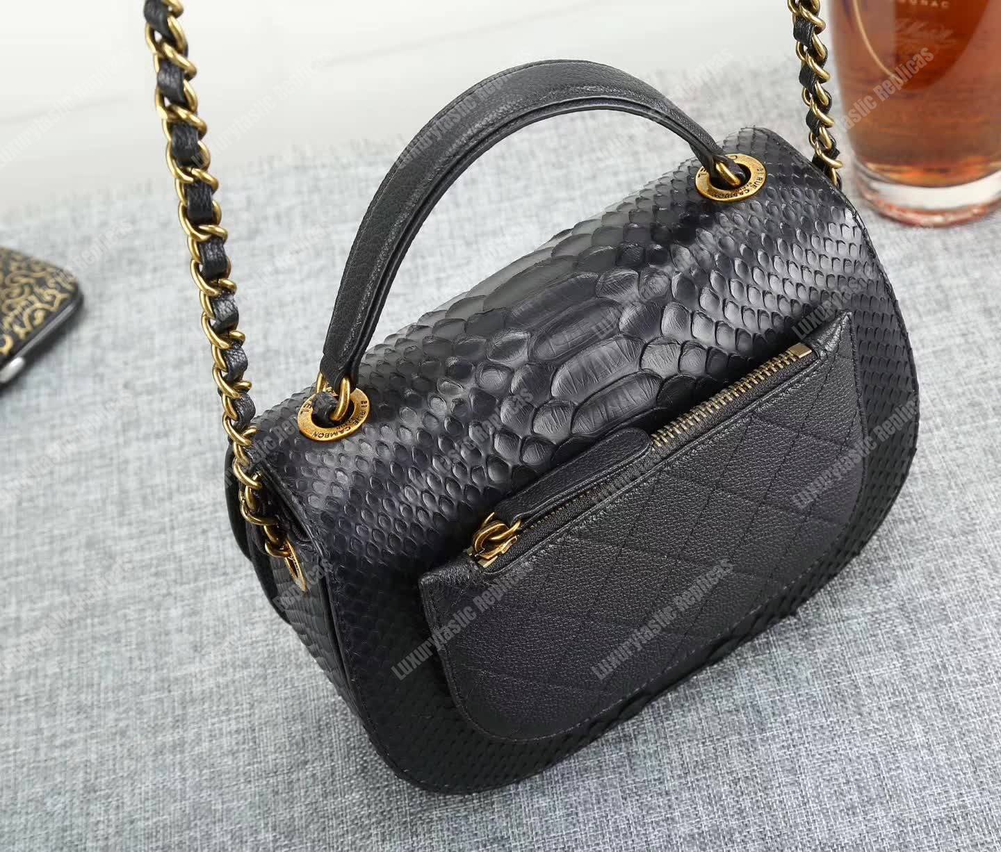 Ch*el medium flap bag with top handle black