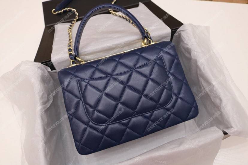 Ch*el small flap bag with top handle navy blue-gold