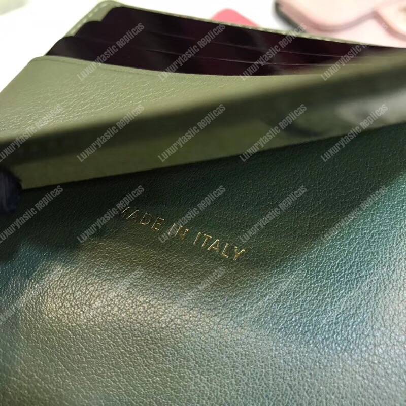 Ch*el classic small flap wallet dark green