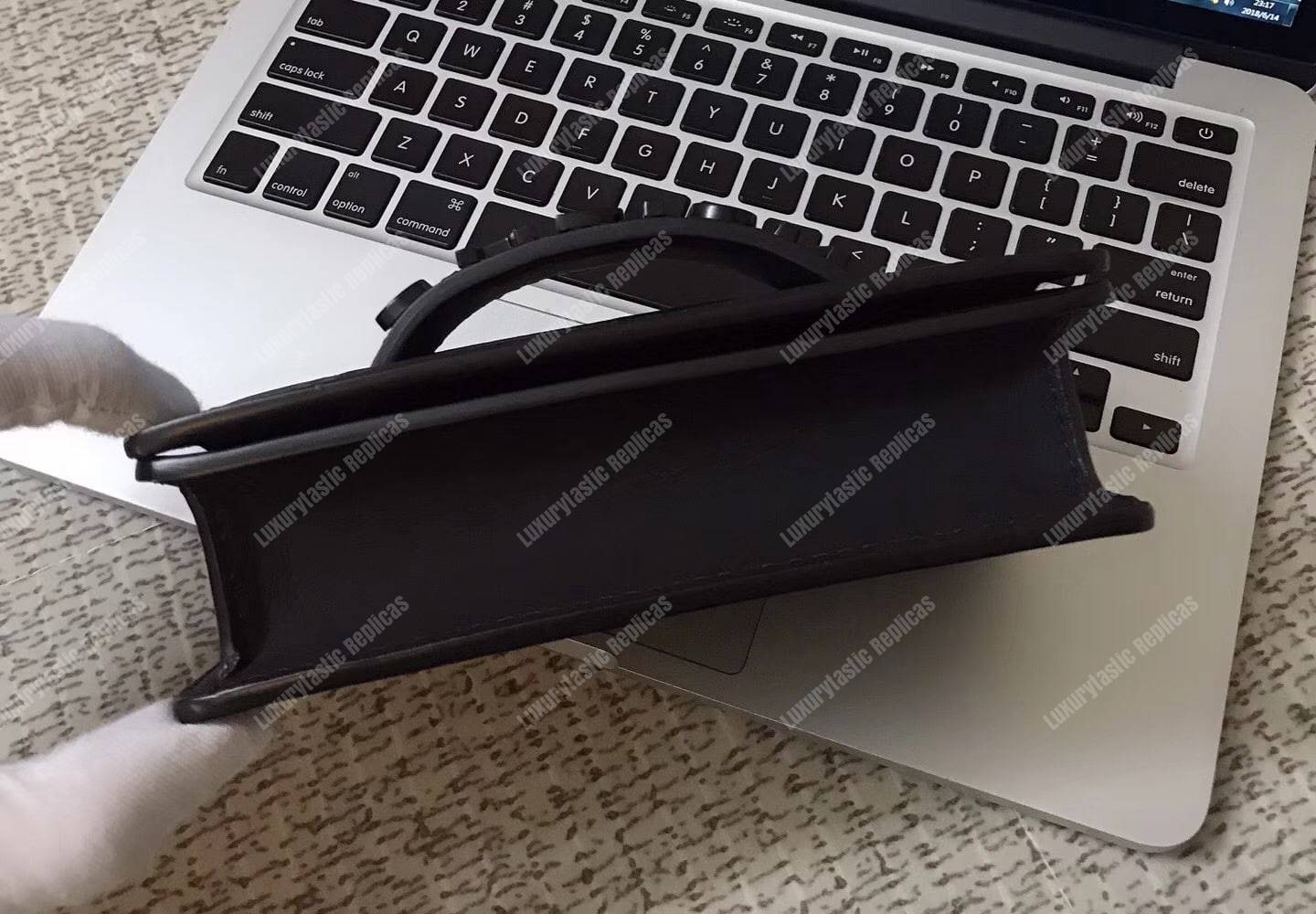 mini j’aD*or flap bag – black calfskin