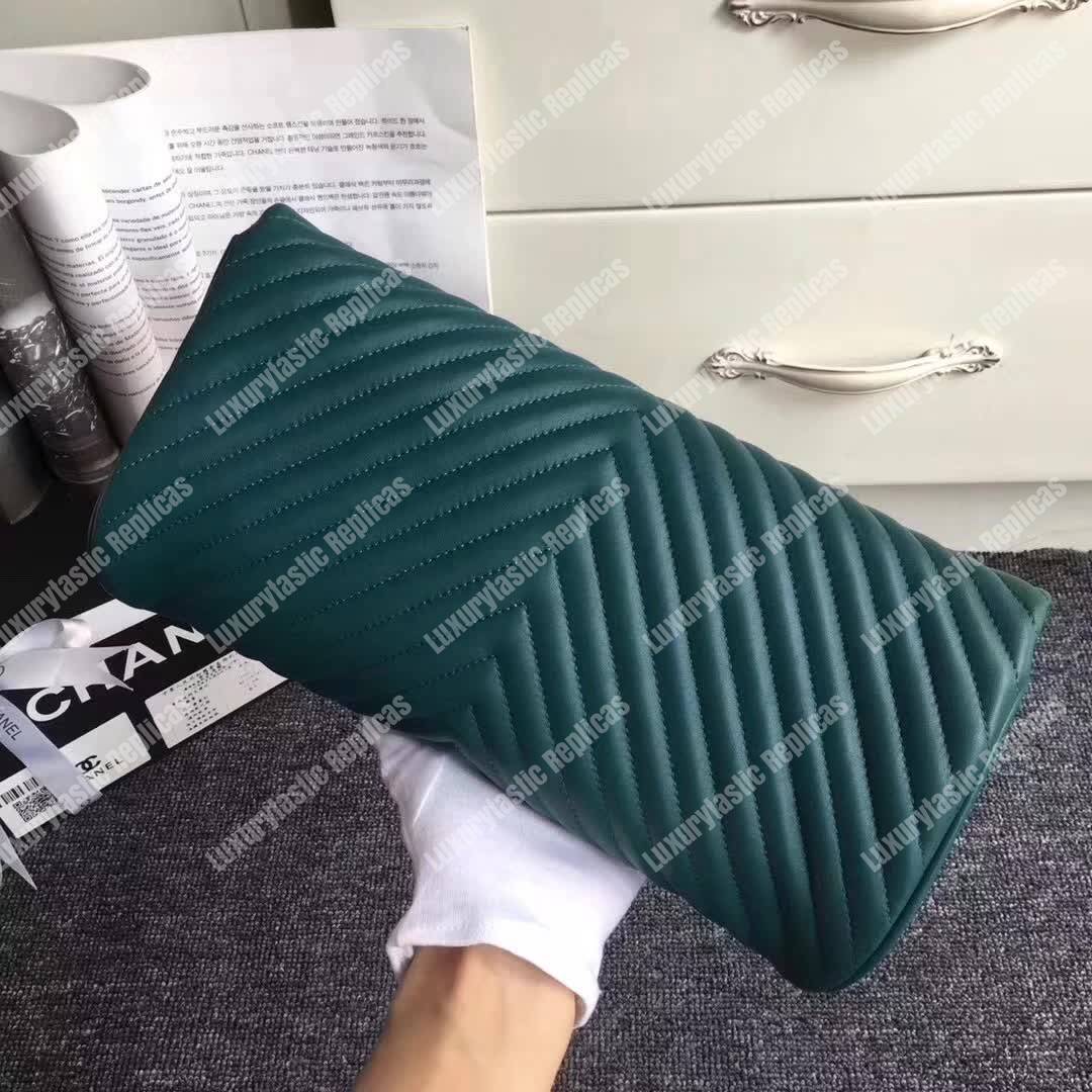 Ch*el reversed clutch green