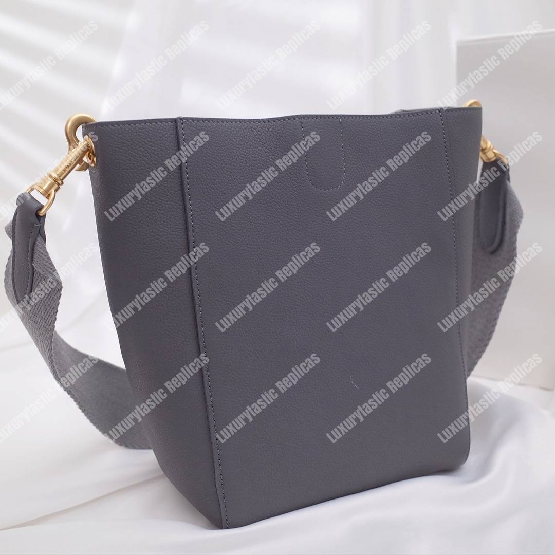 Ce**e sangle small bucket bag in soft grained calfskin grey