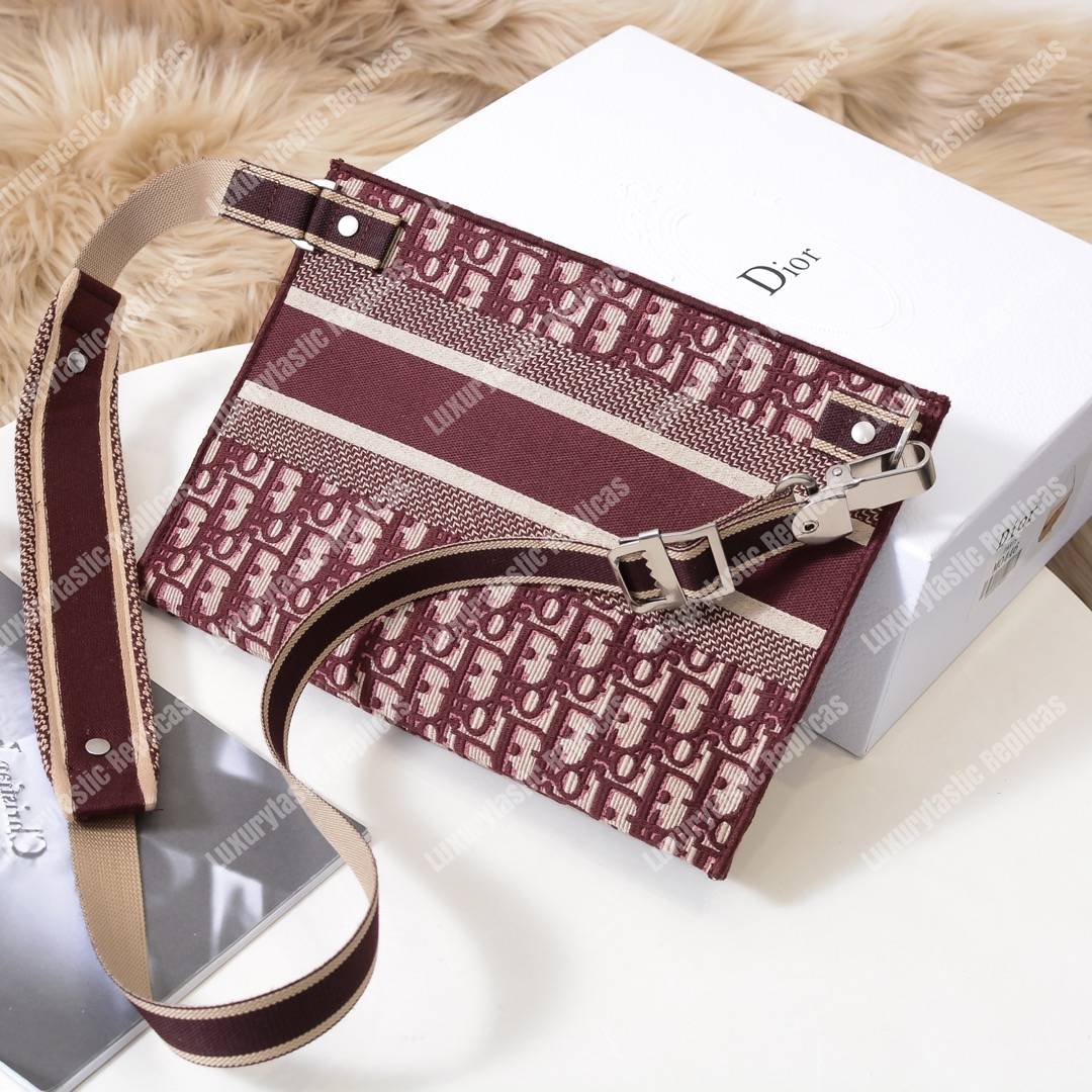 D*or burgundy oblique embroidered canvas clutch