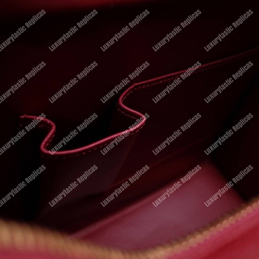 Micro Luggage Handbag In Drummed Calfskin Light Burgundy