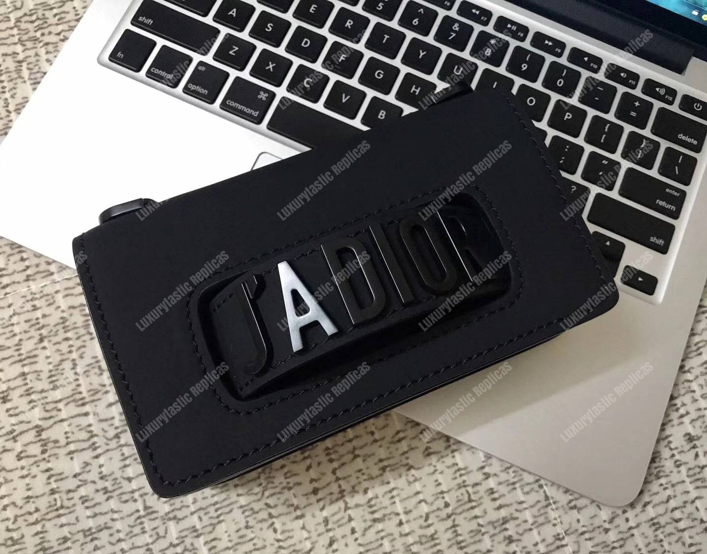 mini j’aD*or flap bag – black calfskin