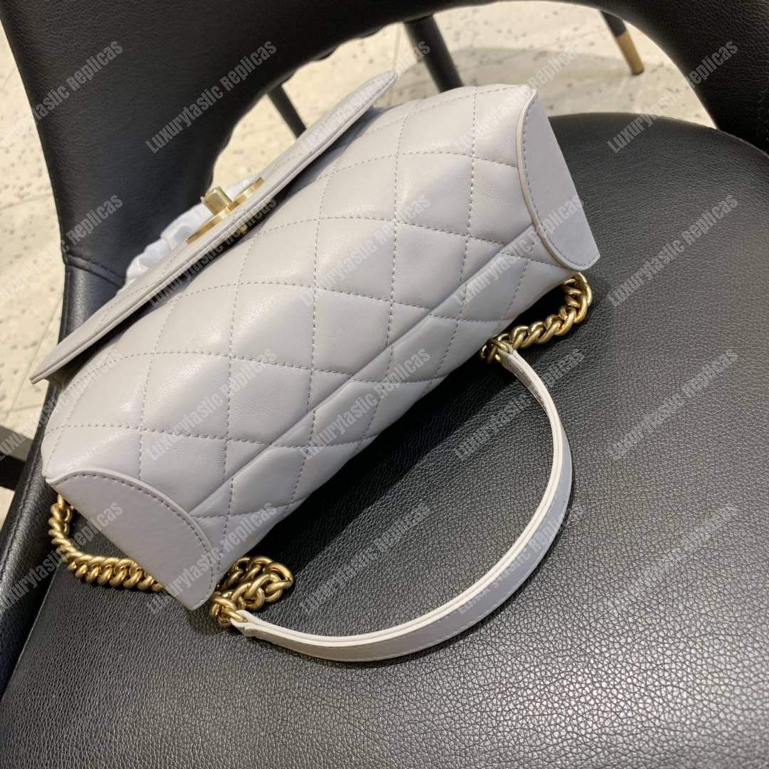Ch*el flap bag with top handle lambskin white