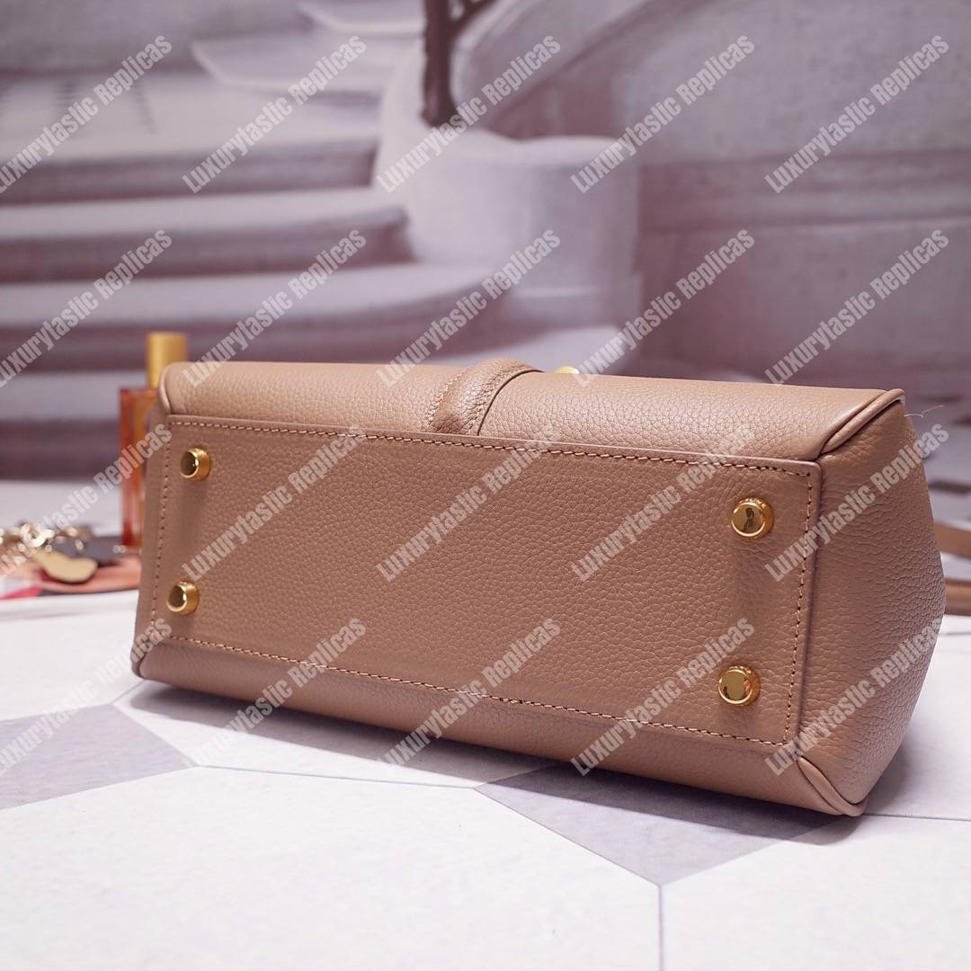 Ce**e small 16 bag in grained calfskin beige