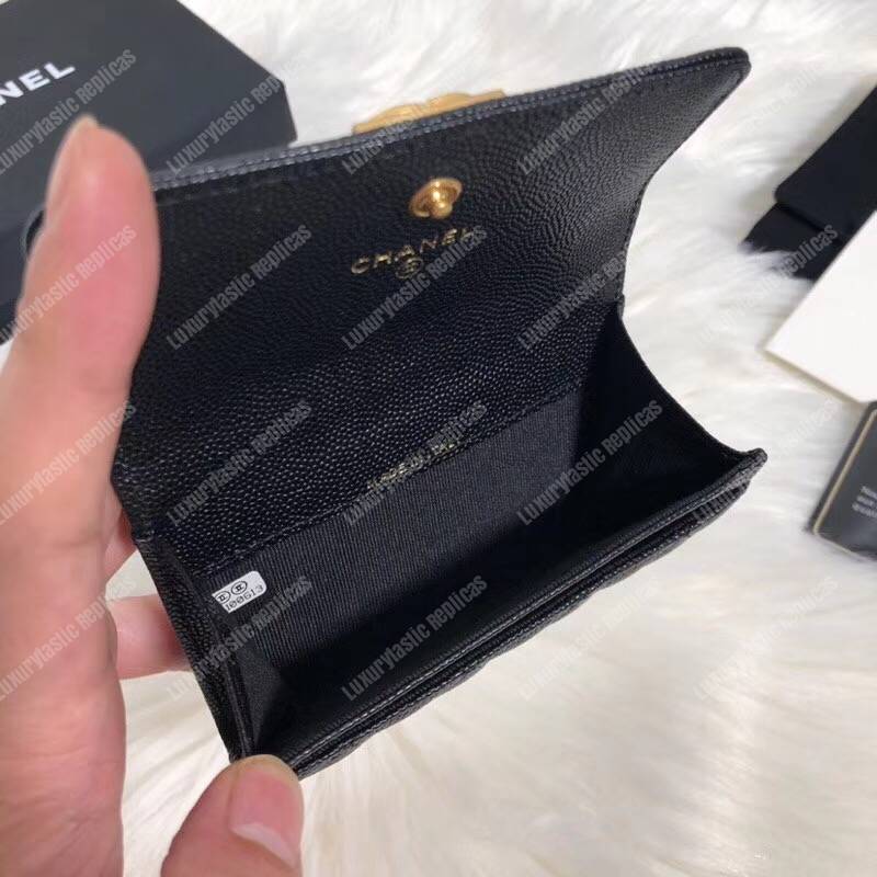 Ch*el boy small flap wallet black