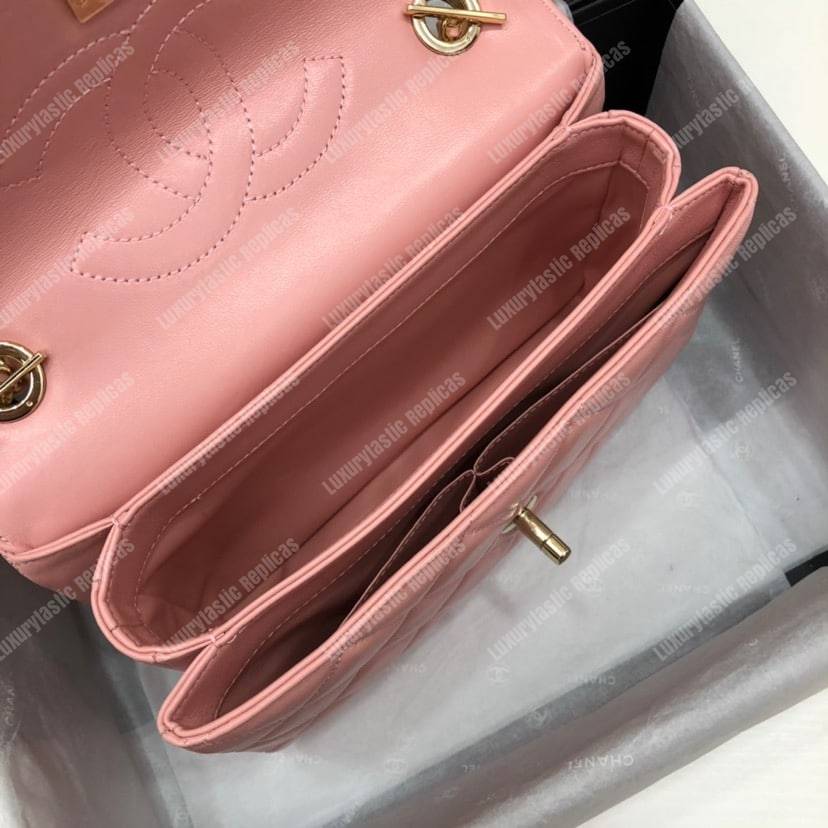 Ch*el small flap bag with top handle pink-gold
