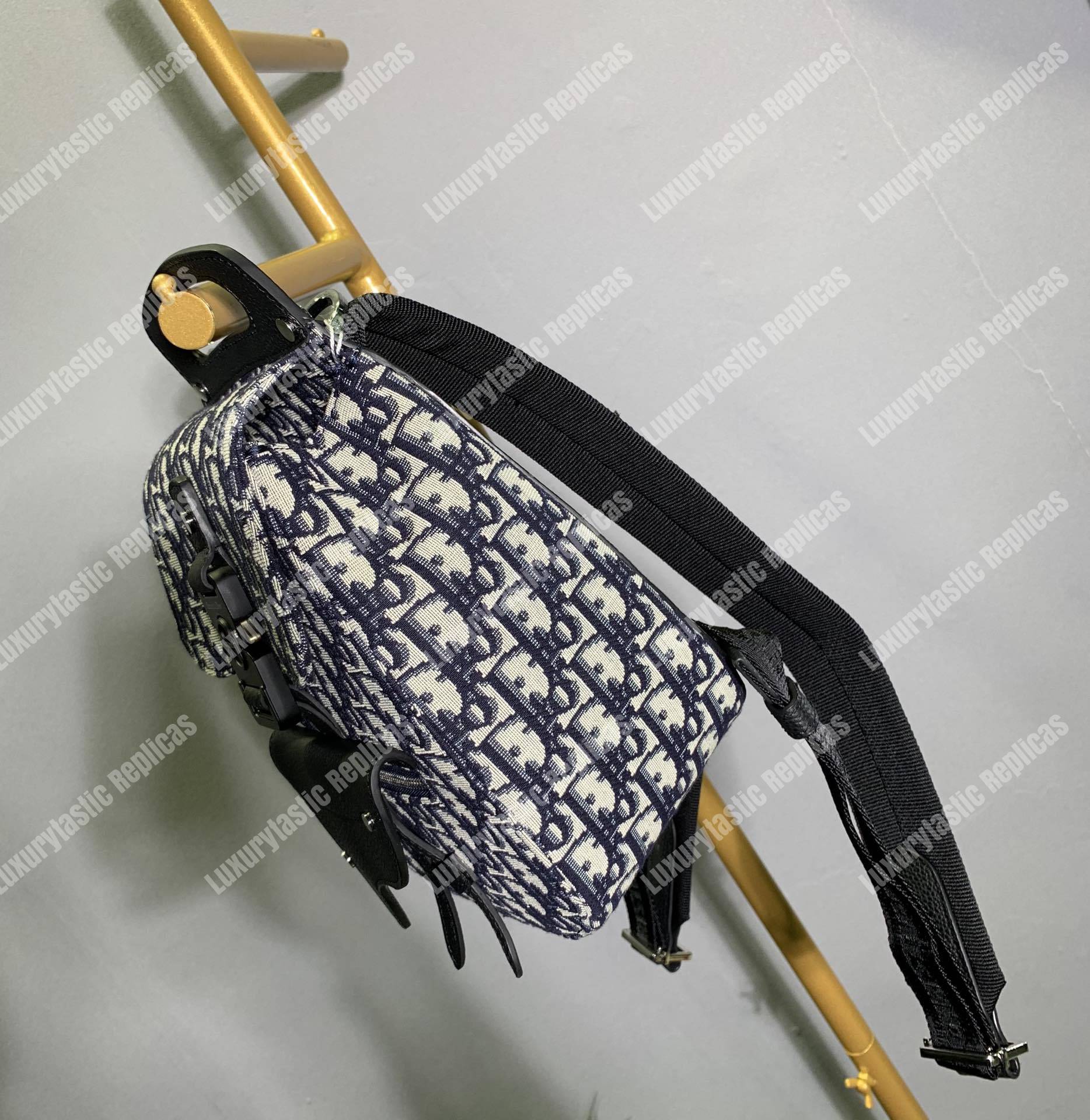 D*or navy blue oblique jacquard mini saddle backpack