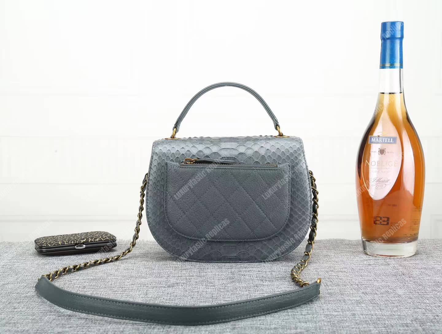 Ch*el medium flap bag with top handle grey