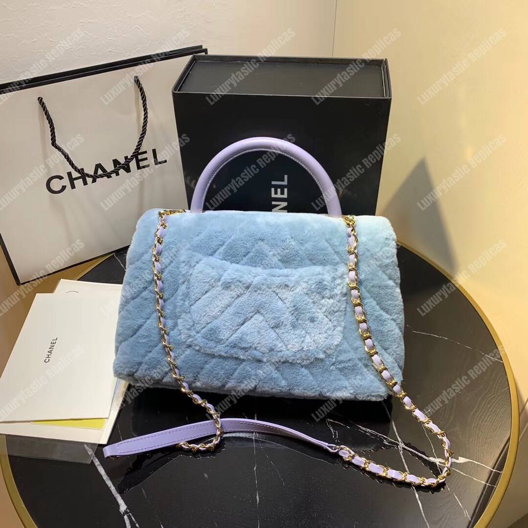 Ch*el flap bag with top handle sky blue