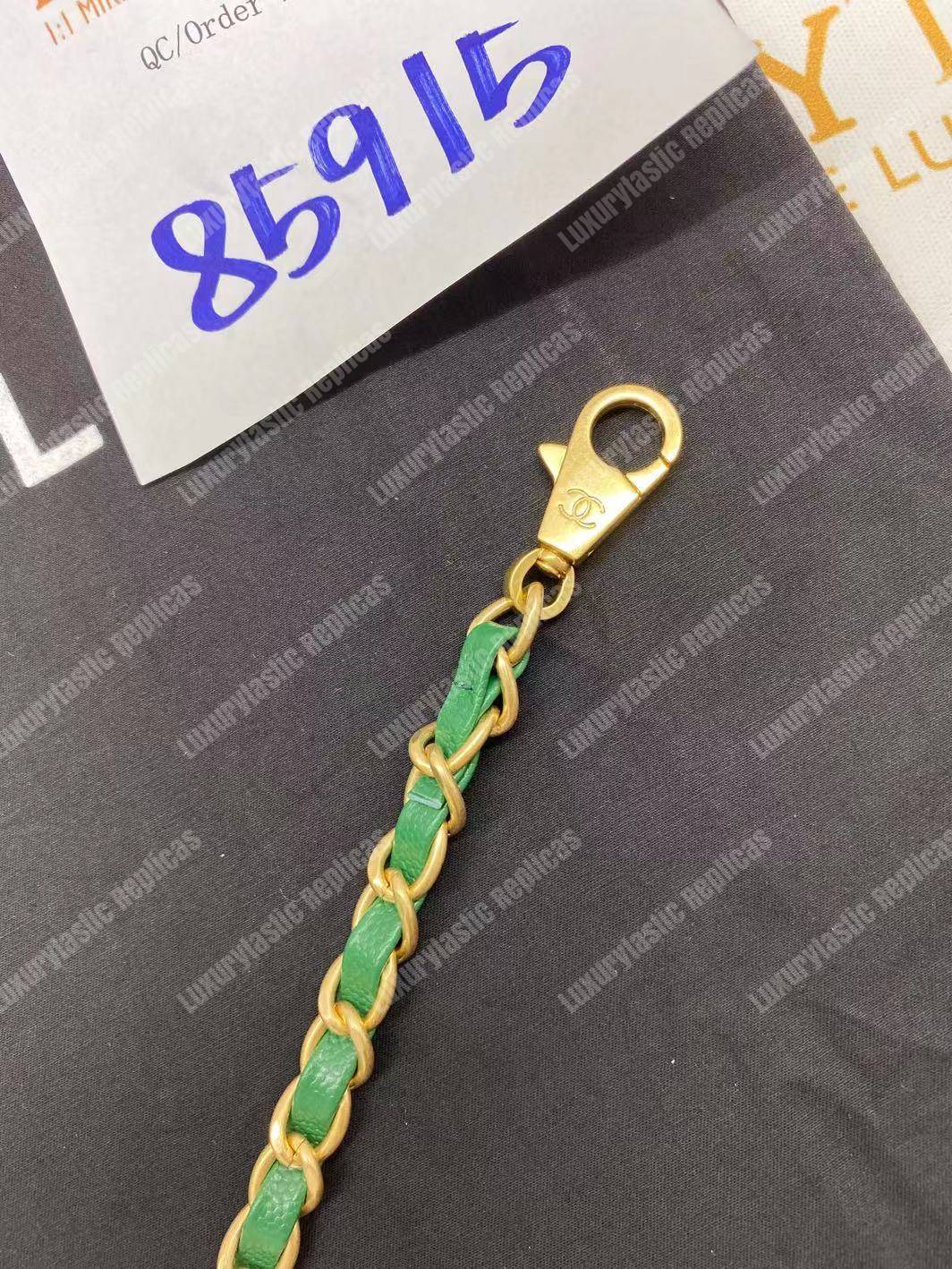 Ch*el flap bag with top handle green