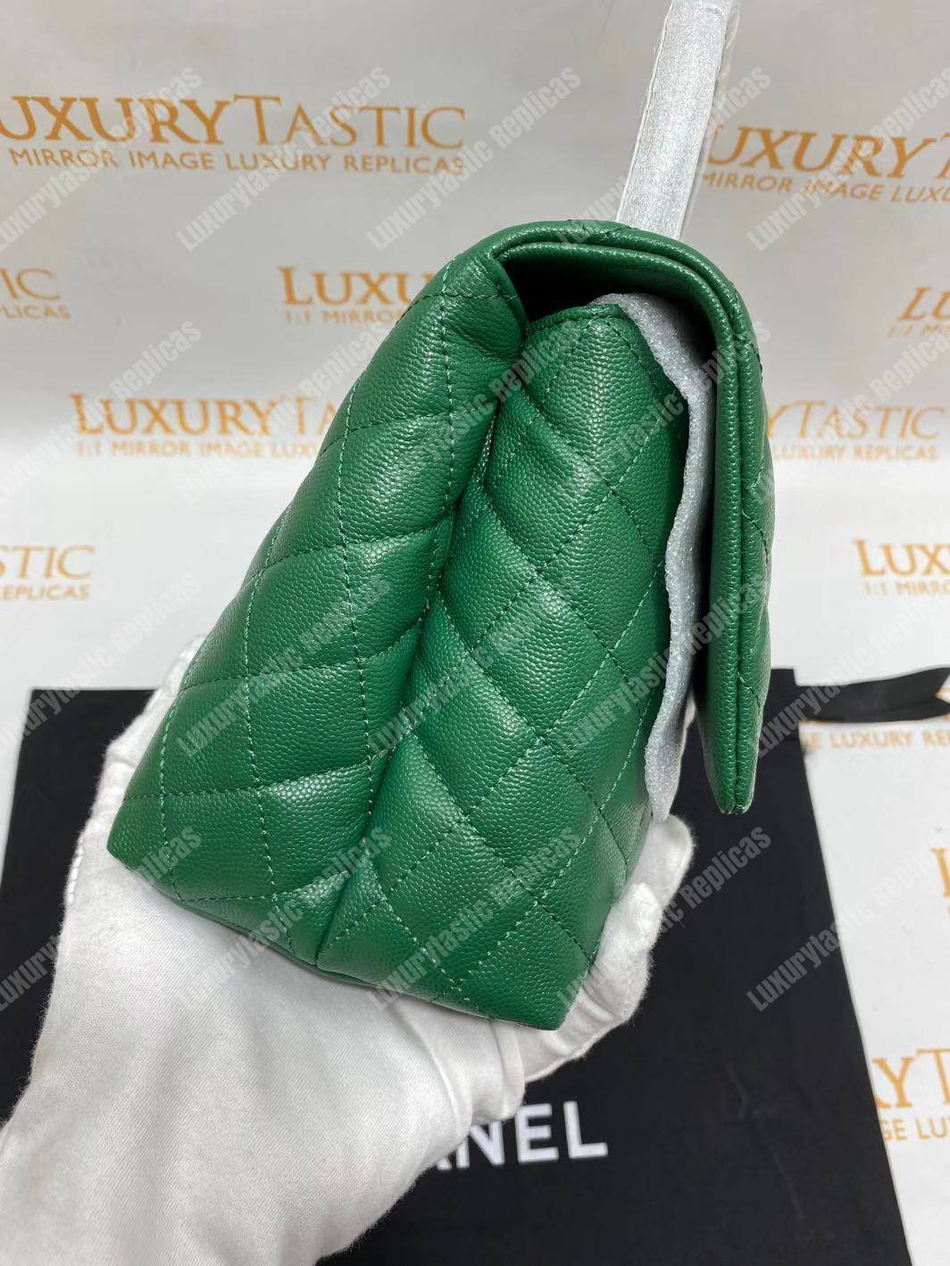 Ch*el flap bag with top handle green