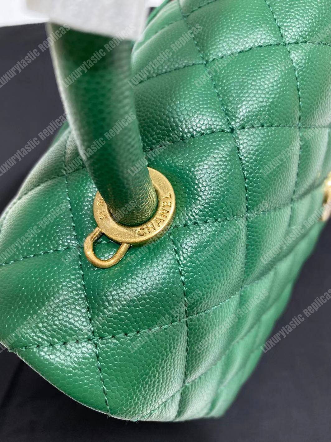 Ch*el flap bag with top handle green