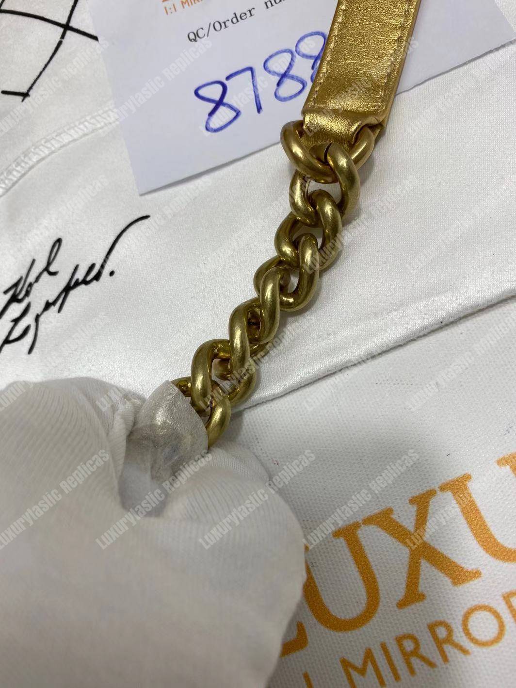 Ch*el boy medium handbag gold & black