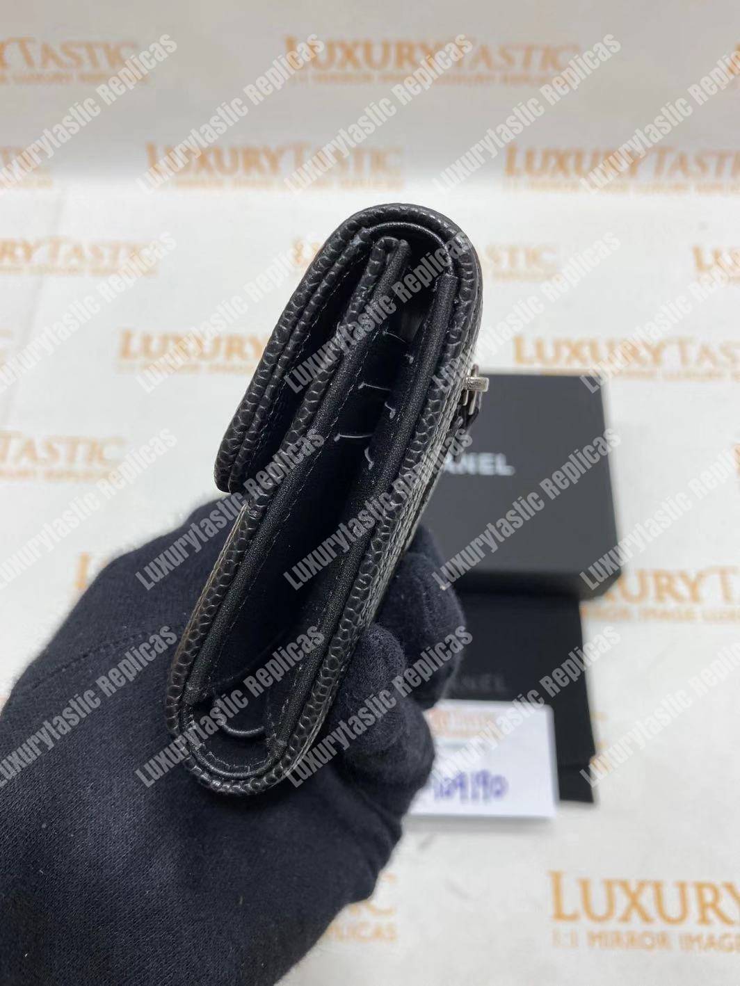 Ch*el boy small flap wallet black