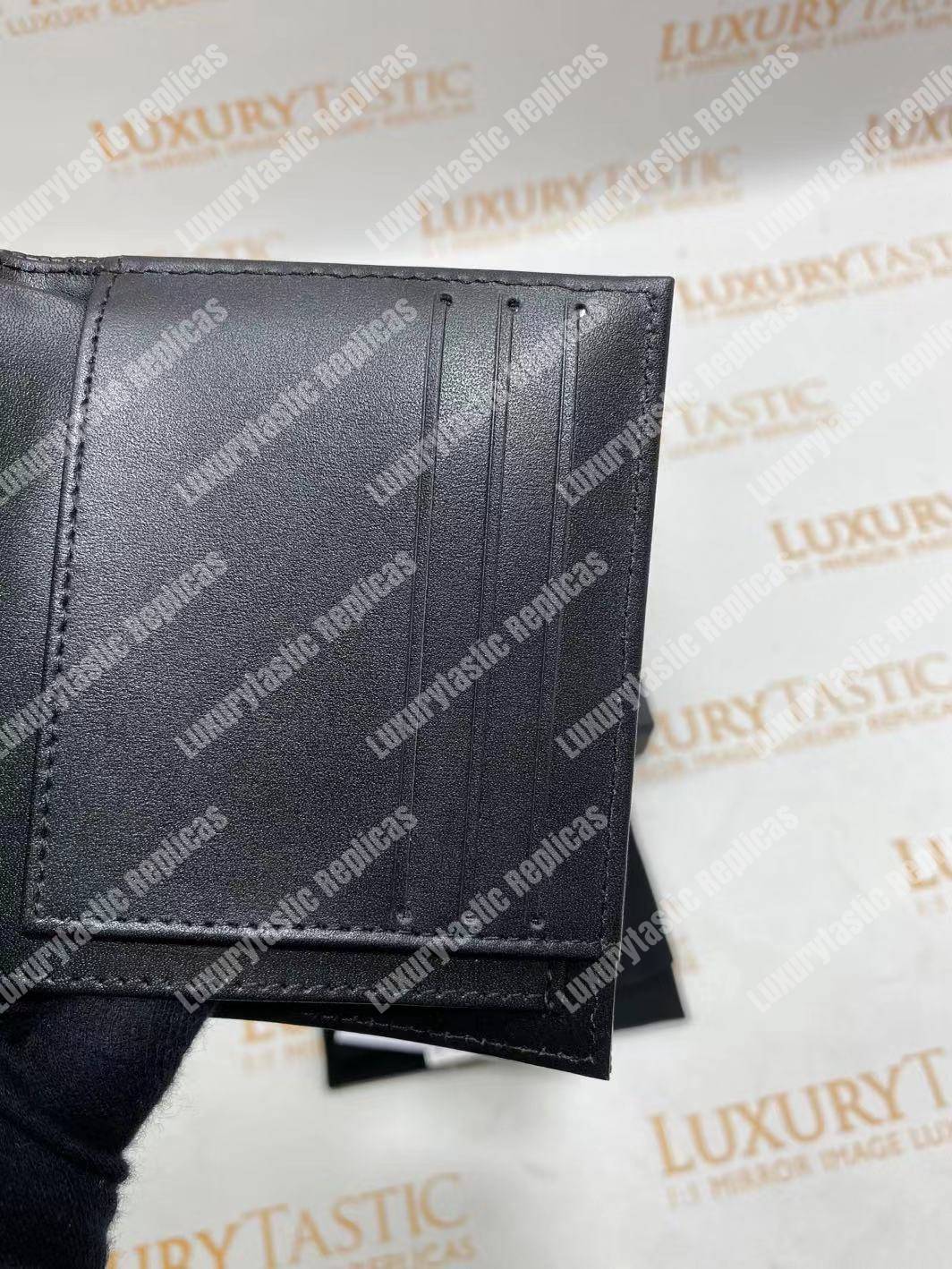 Ch*el boy small flap wallet black