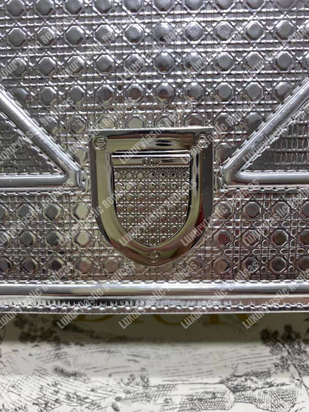 D*orama silver-toned metallic calfskin flap bag