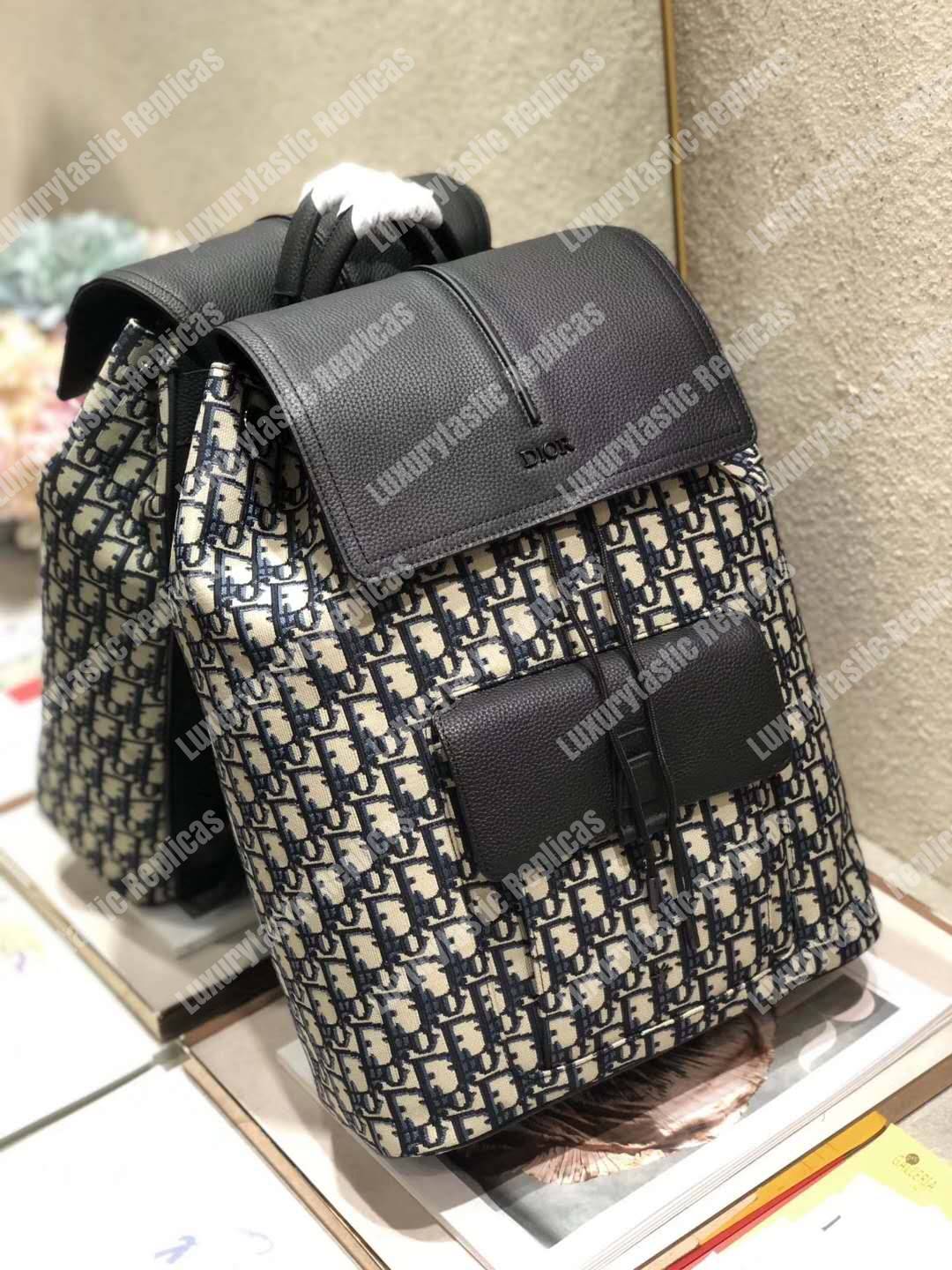 D*or navy blue oblique drawstring motion backpack black/beige