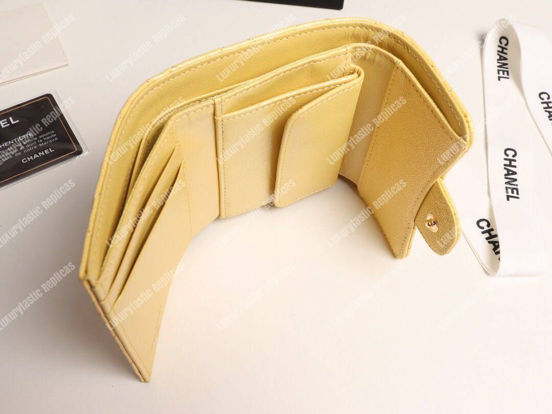 Ch*el classic small flap wallet yellow