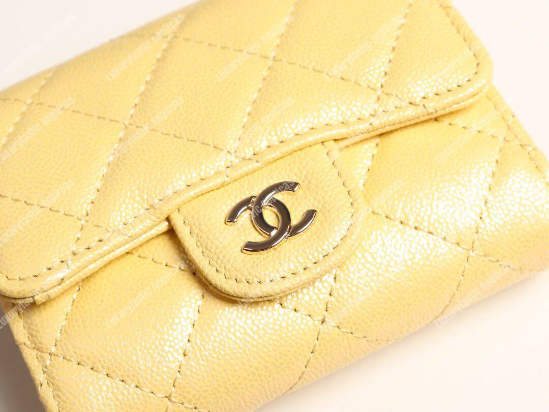 Ch*el classic small flap wallet yellow