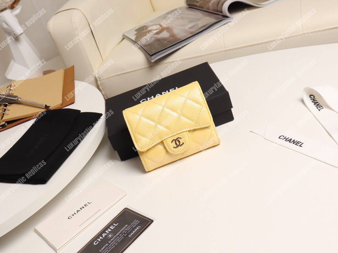 Ch*el classic small flap wallet yellow