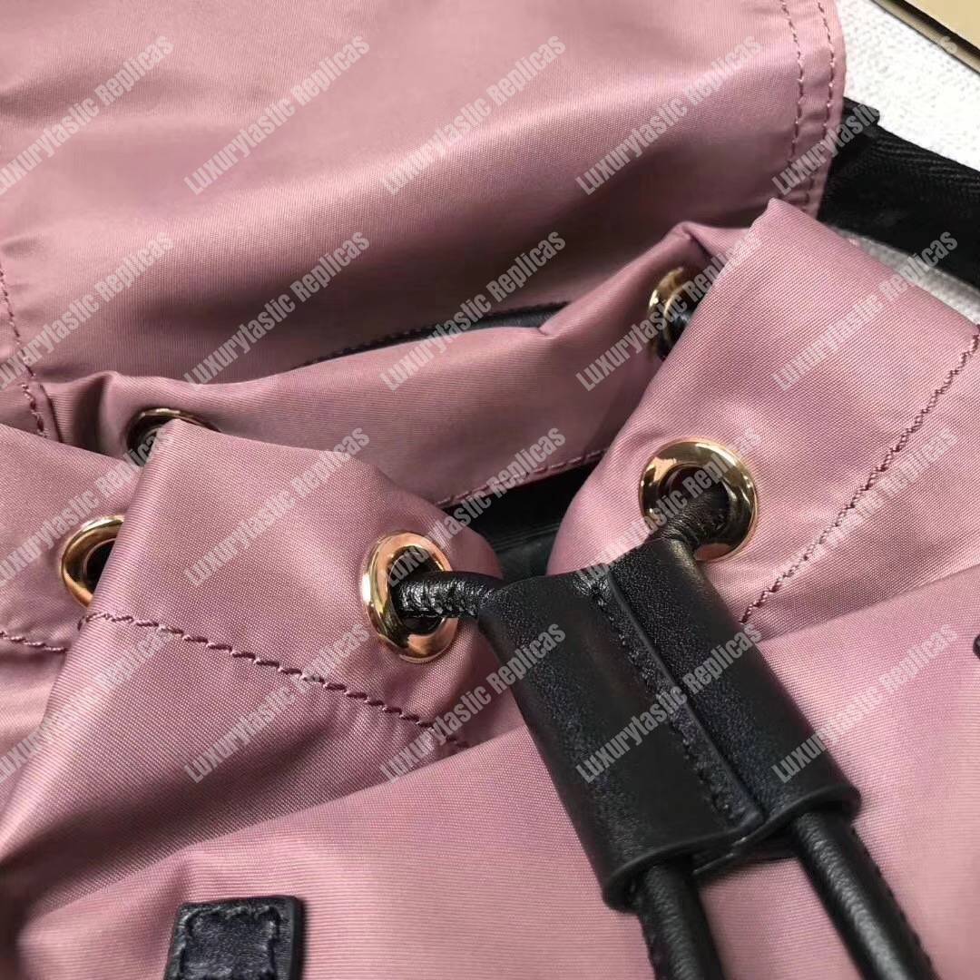 B**rry the small rucksack in pink