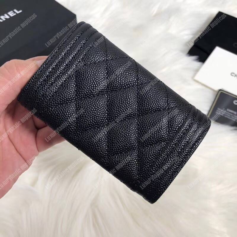 Ch*el boy small flap wallet black