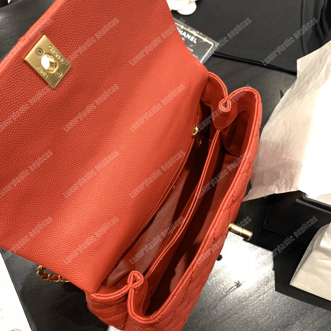 Ch*el flap bag with top handle orange