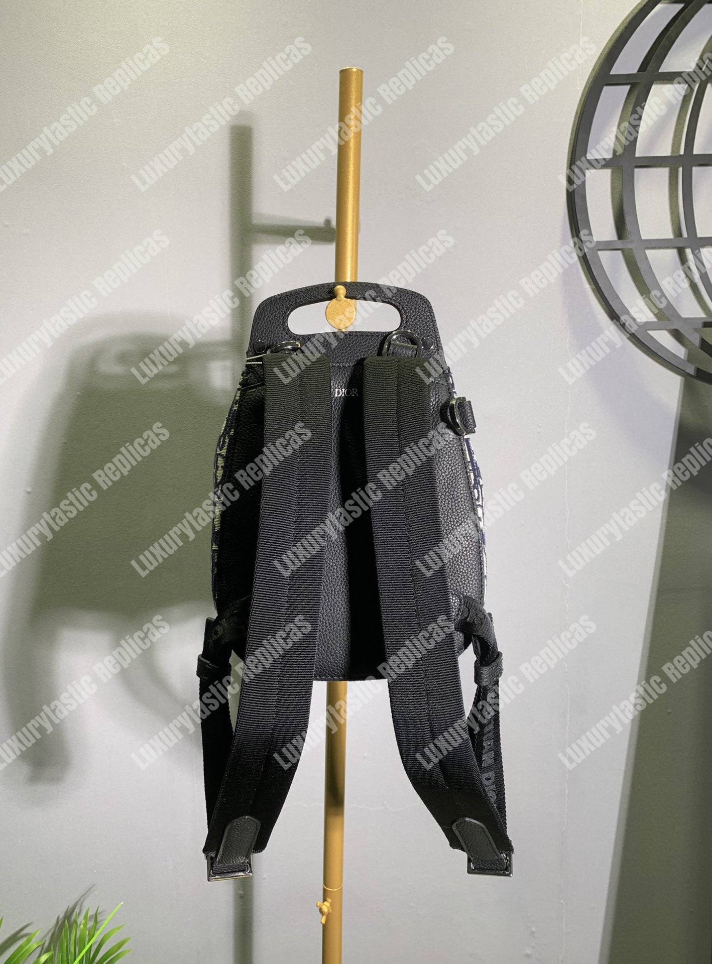 D*or navy blue oblique jacquard mini saddle backpack