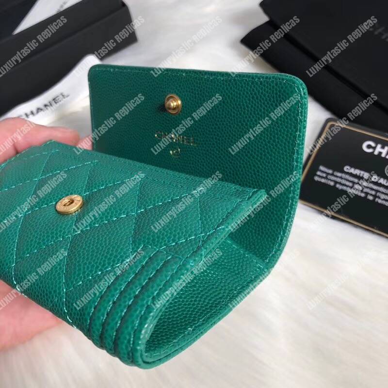 Ch*el boy small flap wallet green