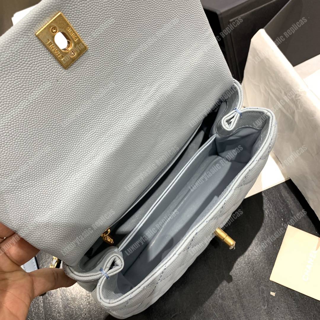 Ch*el flap bag with top handle caviar leather sky blue