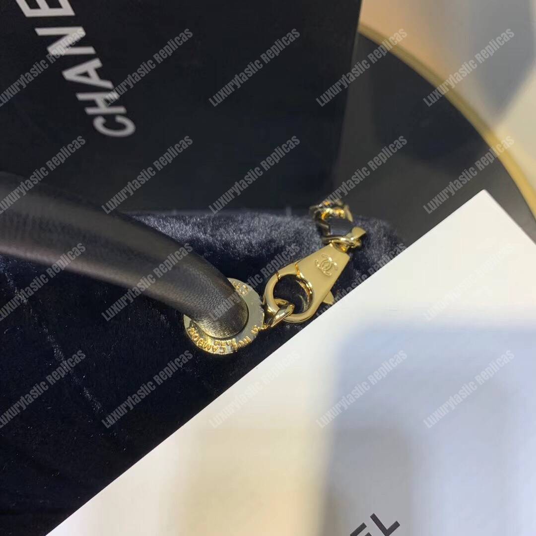 Ch*el flap bag with top handle black