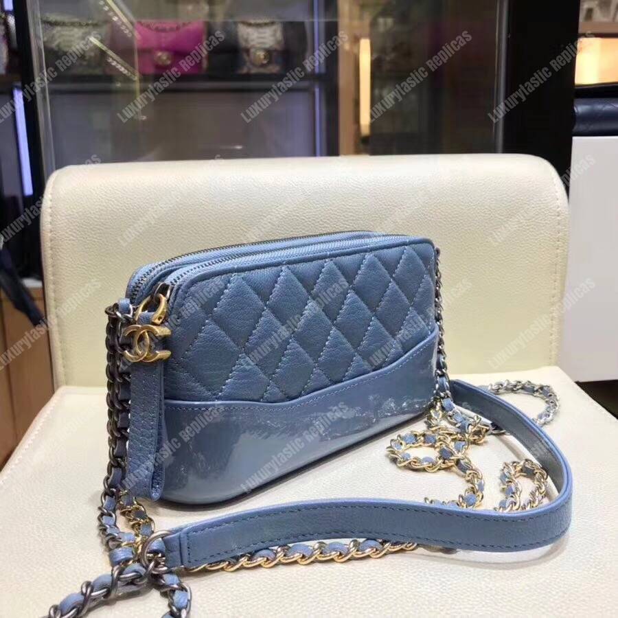 Ch*el clutch with chain baby blue