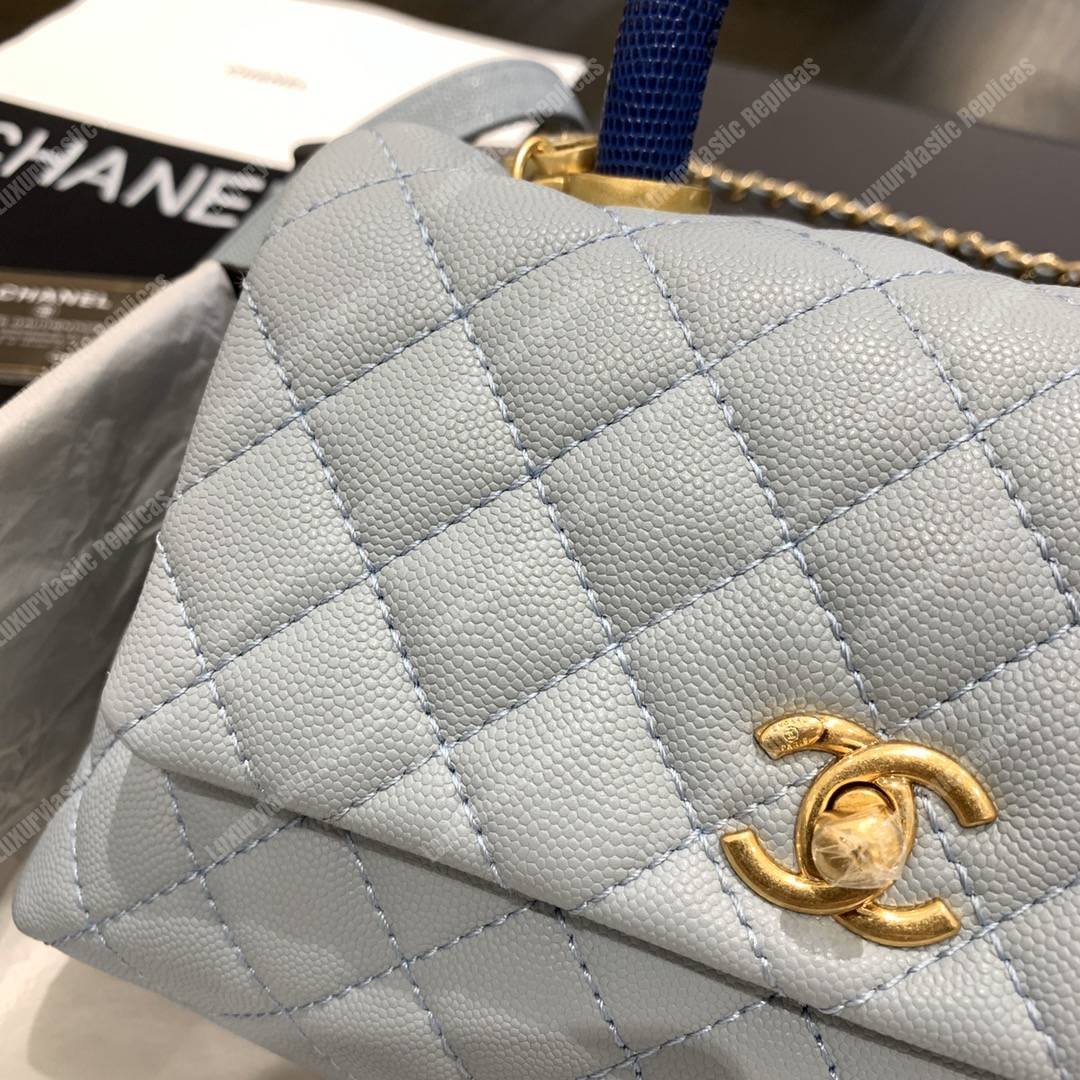 Ch*el flap bag with top handle caviar leather sky blue
