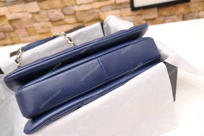 Ch*el small flap bag with top handle navy blue-gold