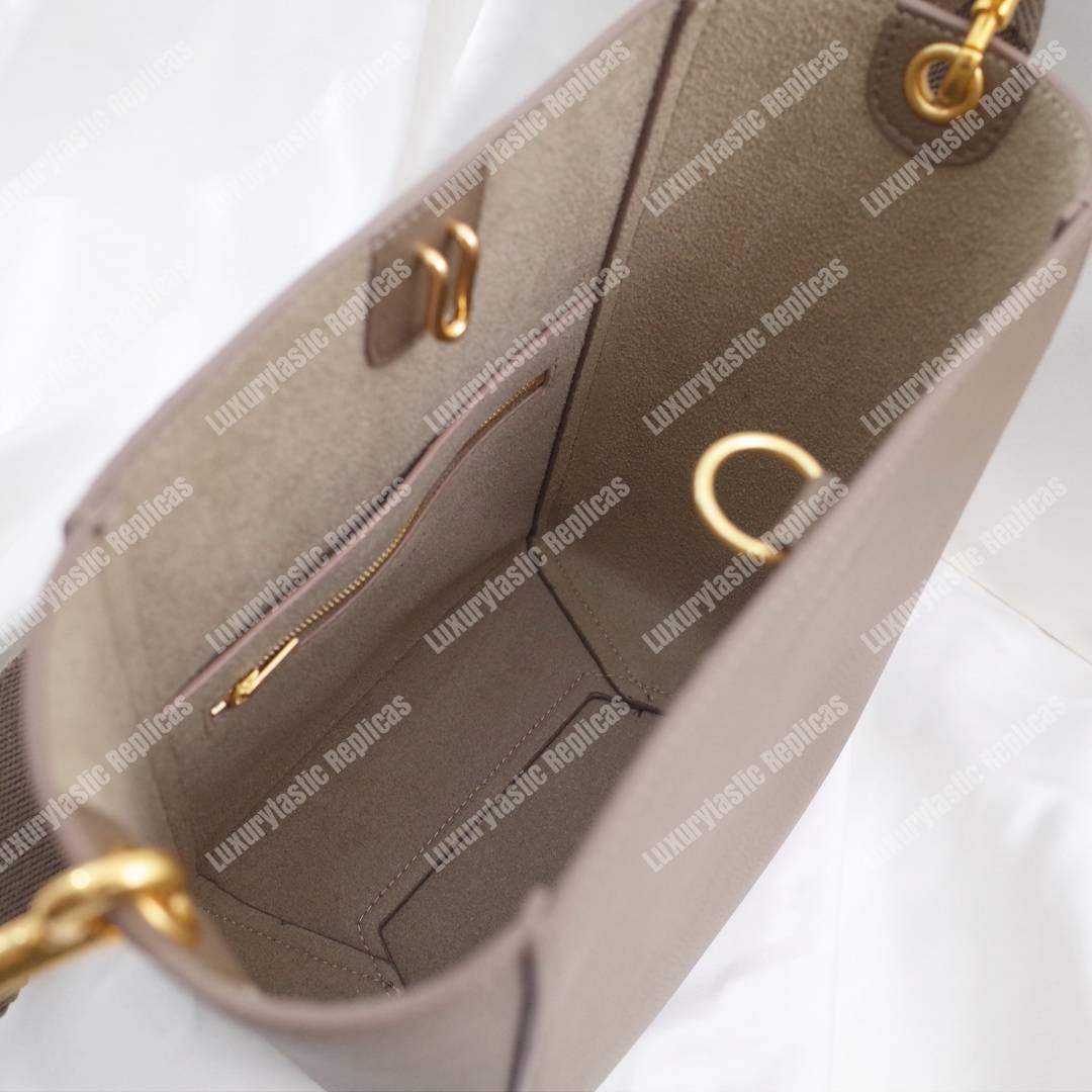 Ce**e sangle small bucket bag in soft grained calfskin taupe