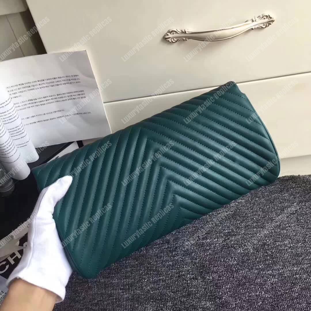 Ch*el reversed clutch green