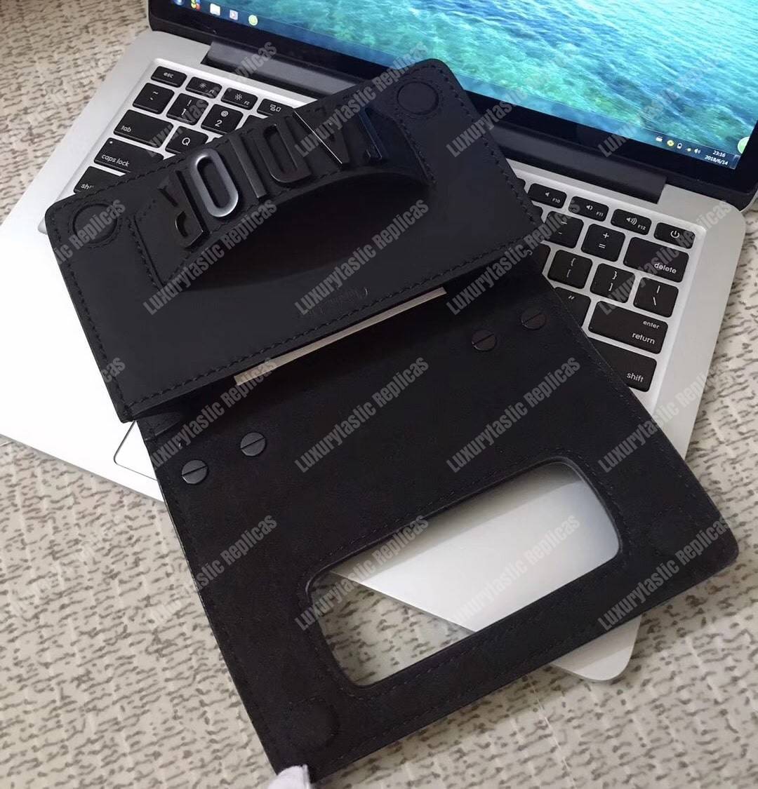 mini j’aD*or flap bag – black calfskin