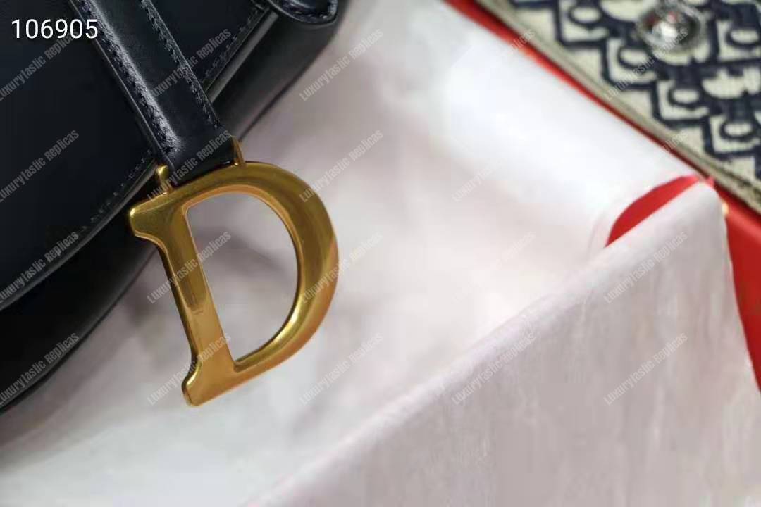 D*or mini saddle bag in black calfskin