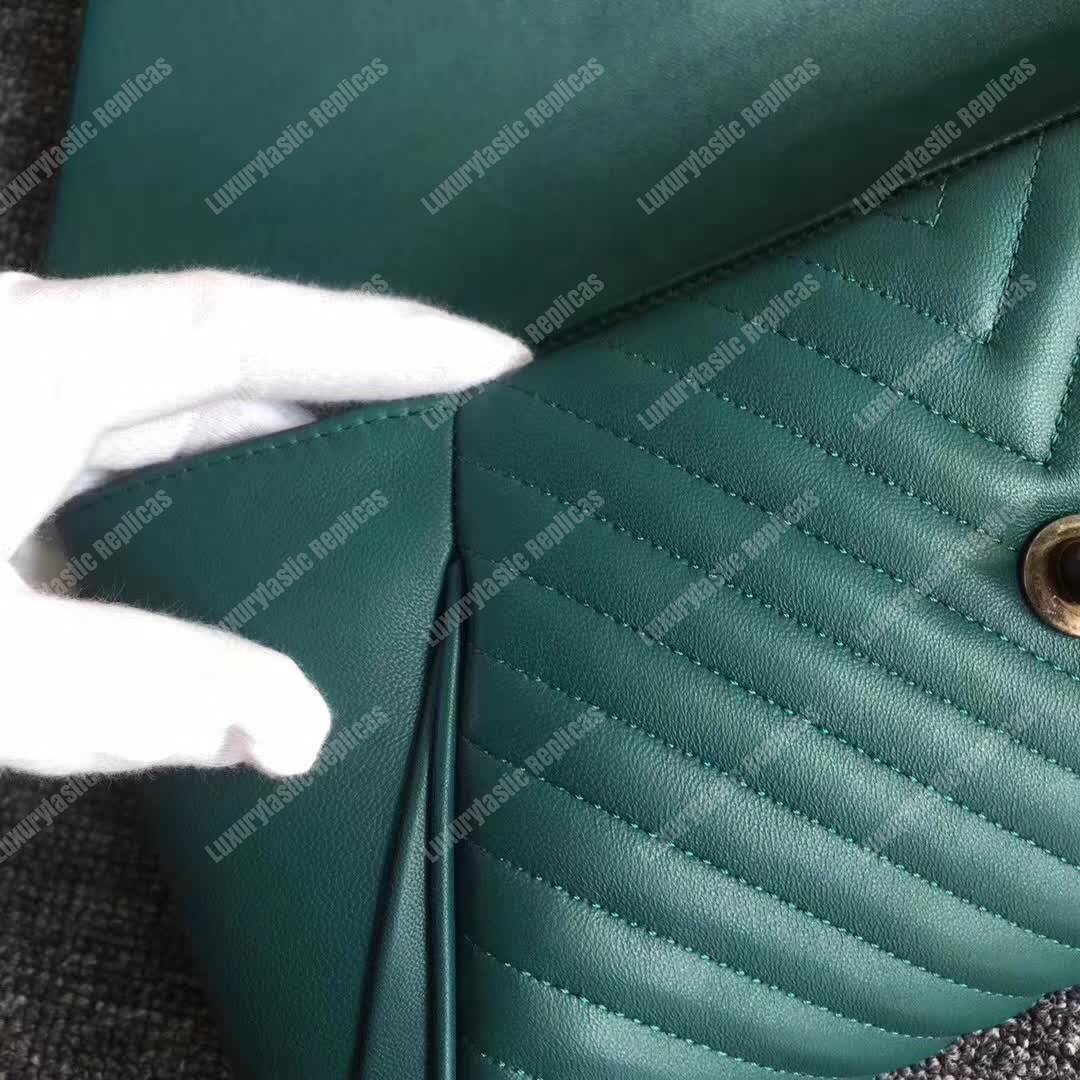 Ch*el reversed clutch green