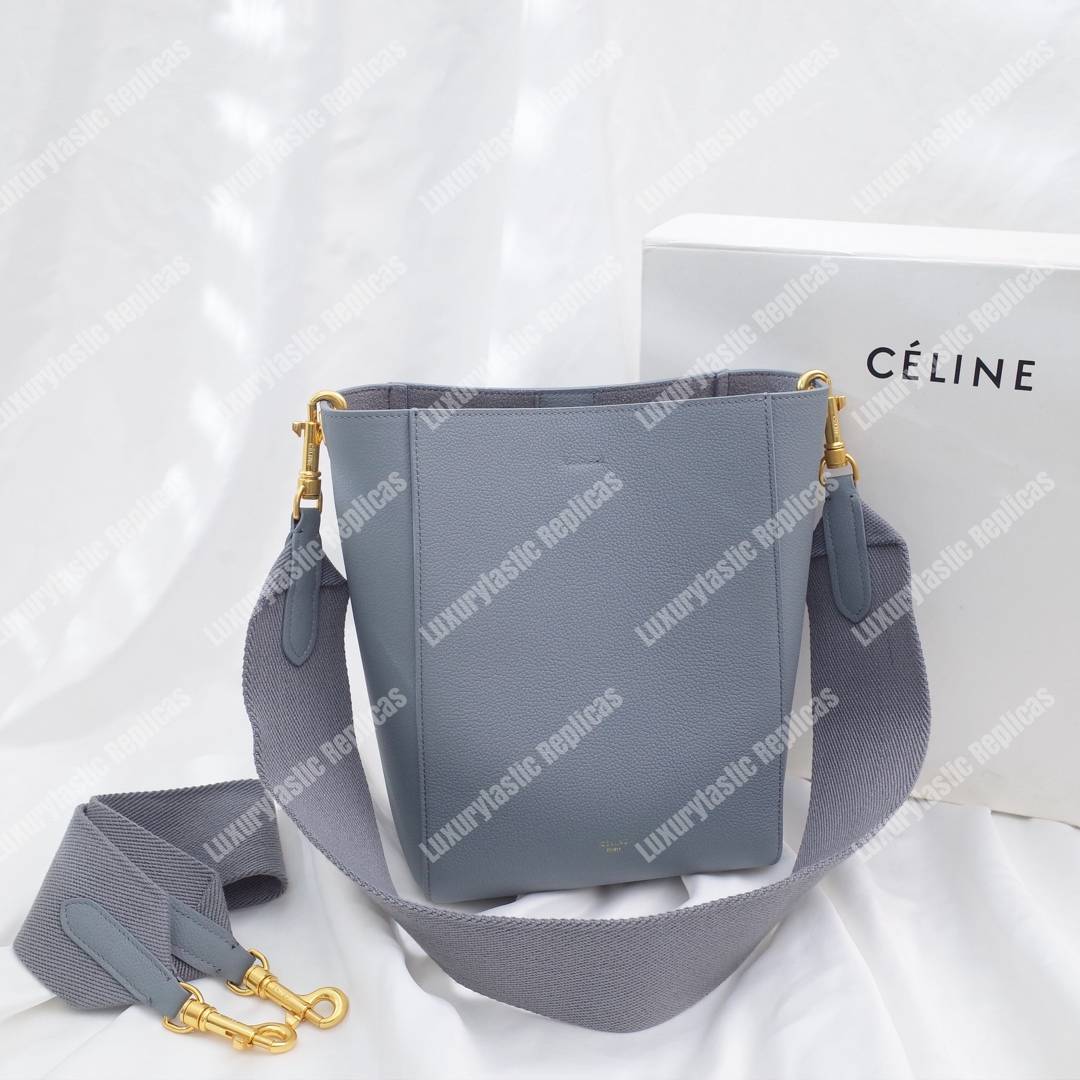 Ce**e sangle small bucket bag in soft grained calfskin cloud