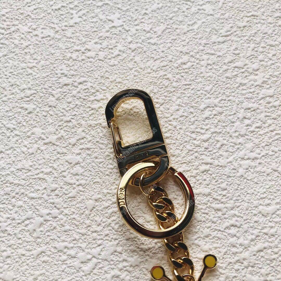 D*or x kaws bee key ring in brass & resin
