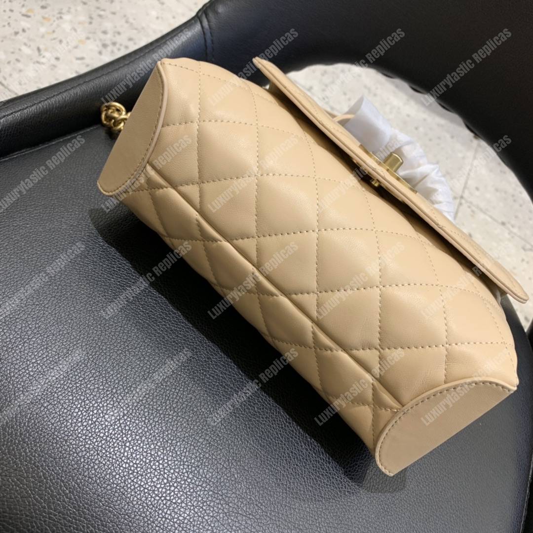 Ch*el flap bag with top handle lambskin beige